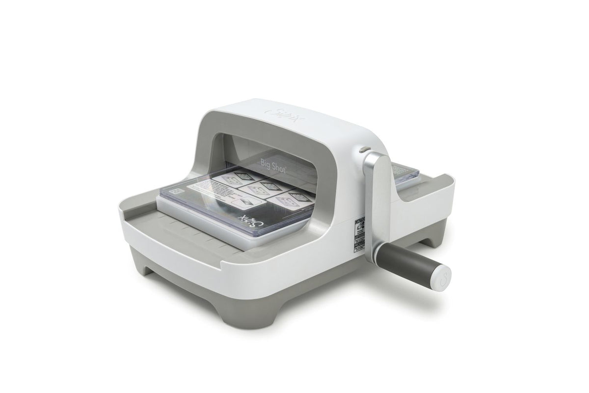 White and gray Sizzix Big Shot manual die-cutting machine